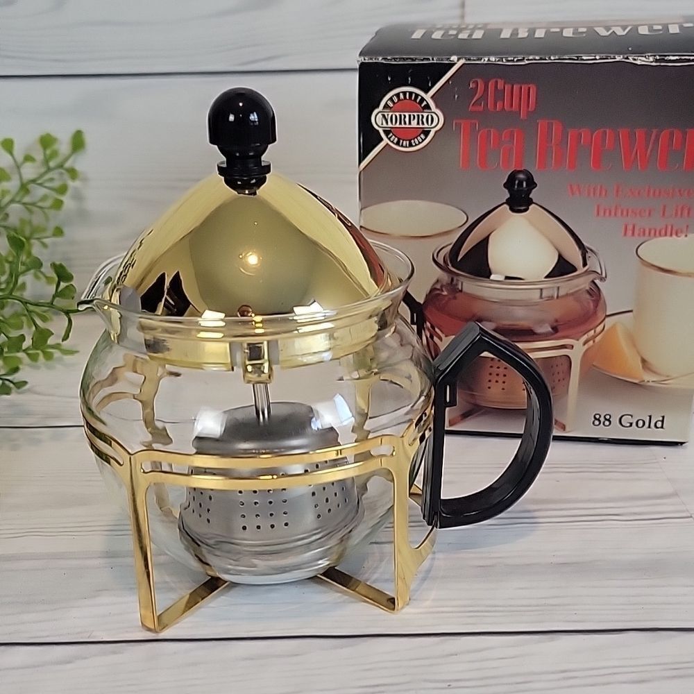 Norpro 2 cup tea brewer with infuser lift handle. Like new